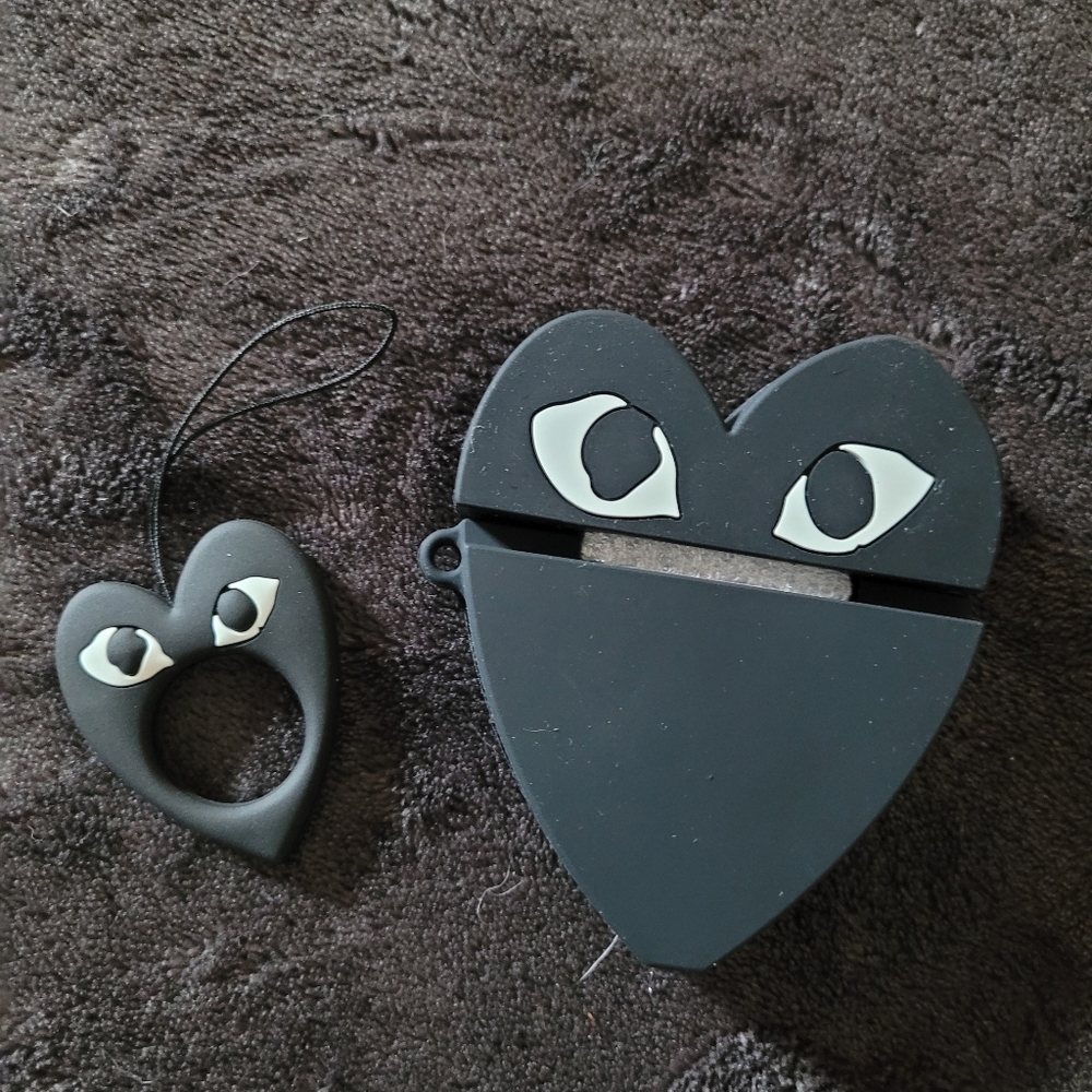 Brand new Comme des Garcons airpod case